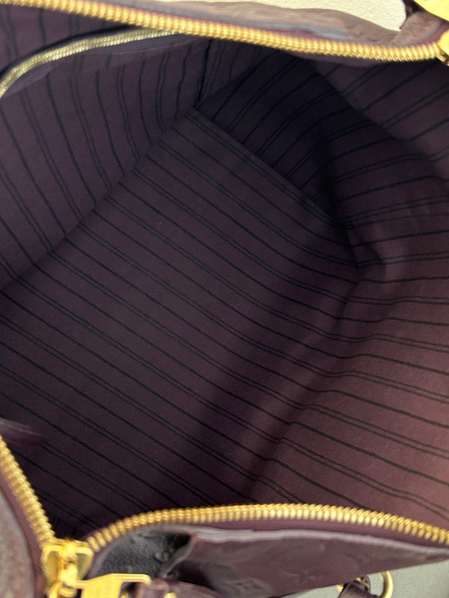 Louis Vuitton Empreinte Lumineuse in purple