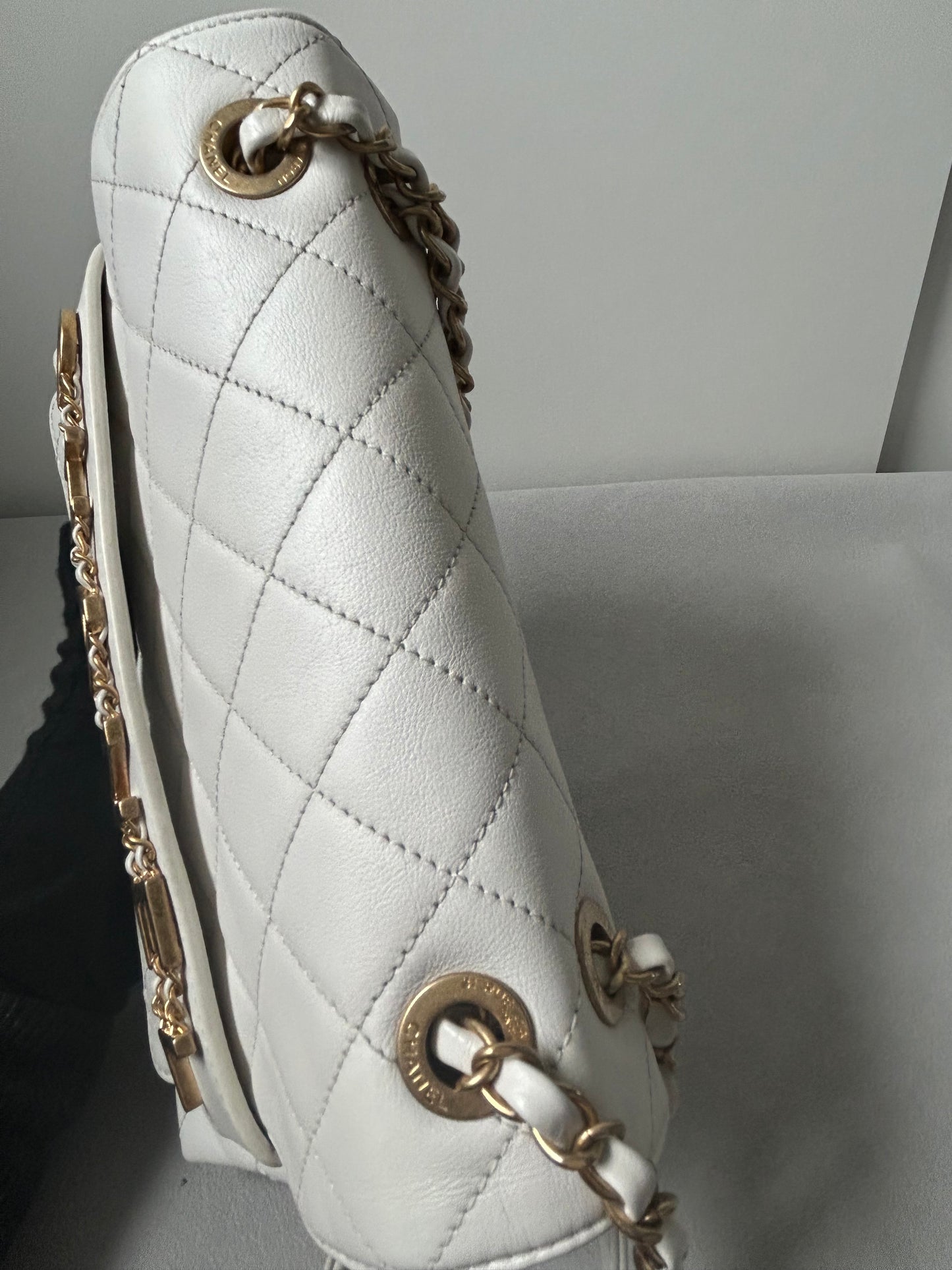 Chanel logo enchained flap bag quilted lambskin