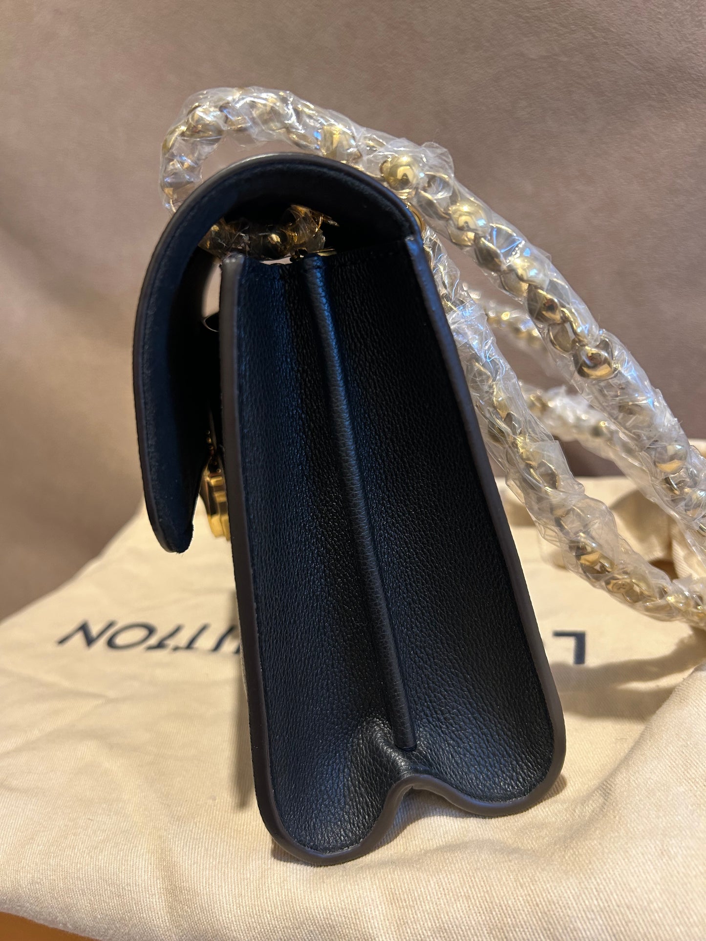 Louis Vuitton victoire in monogram and black leather