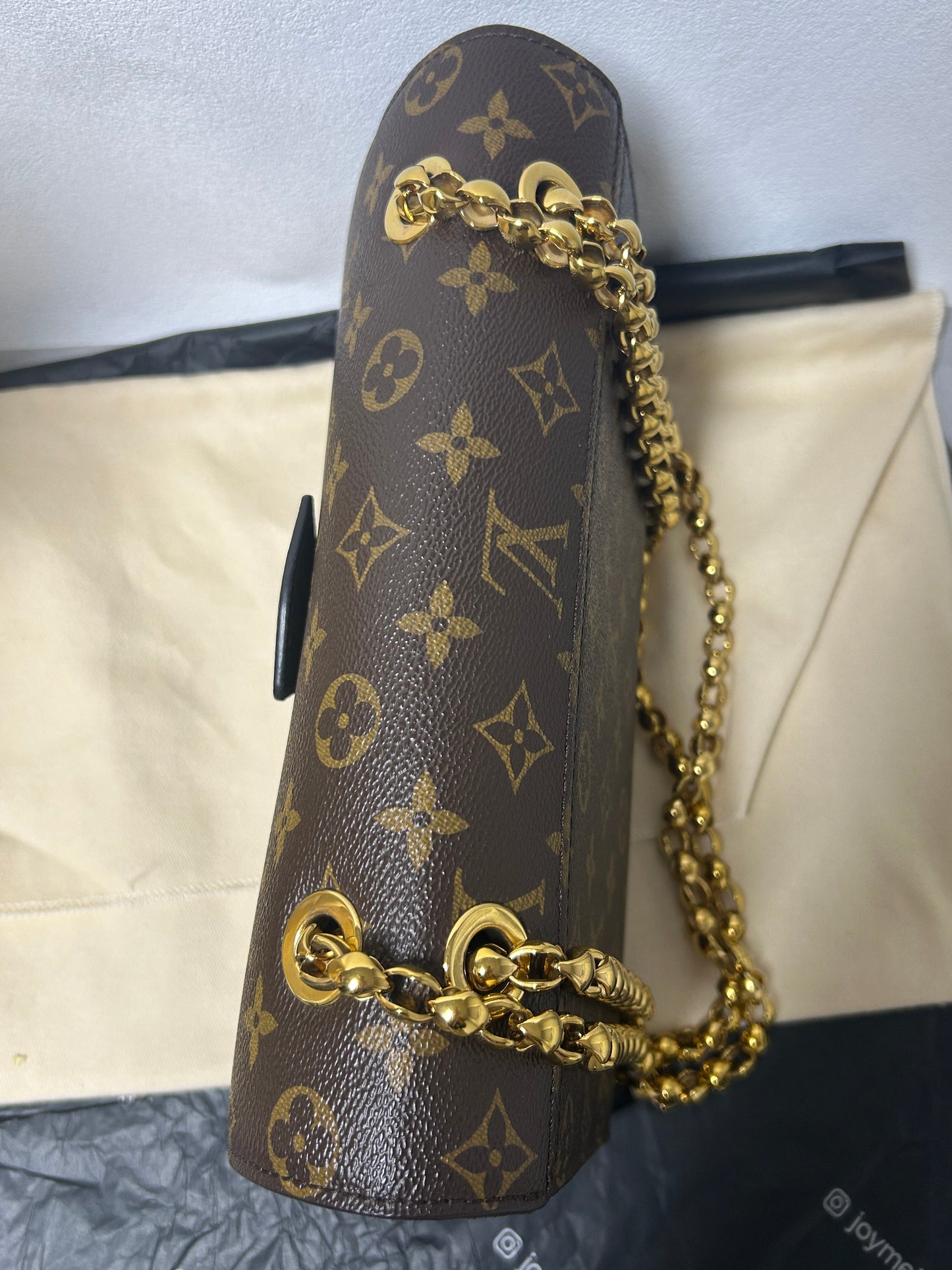 Louis Vuitton victoire monogram and black leather
