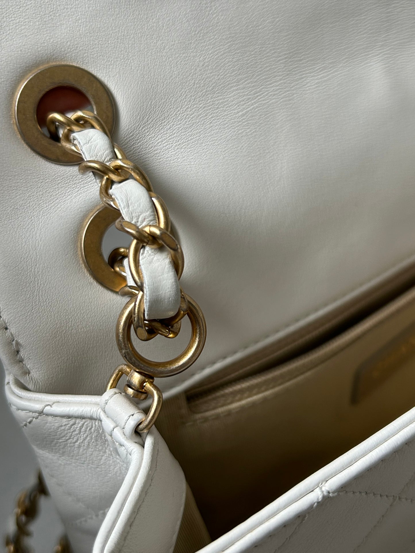 Chanel logo enchained flap bag quilted lambskin