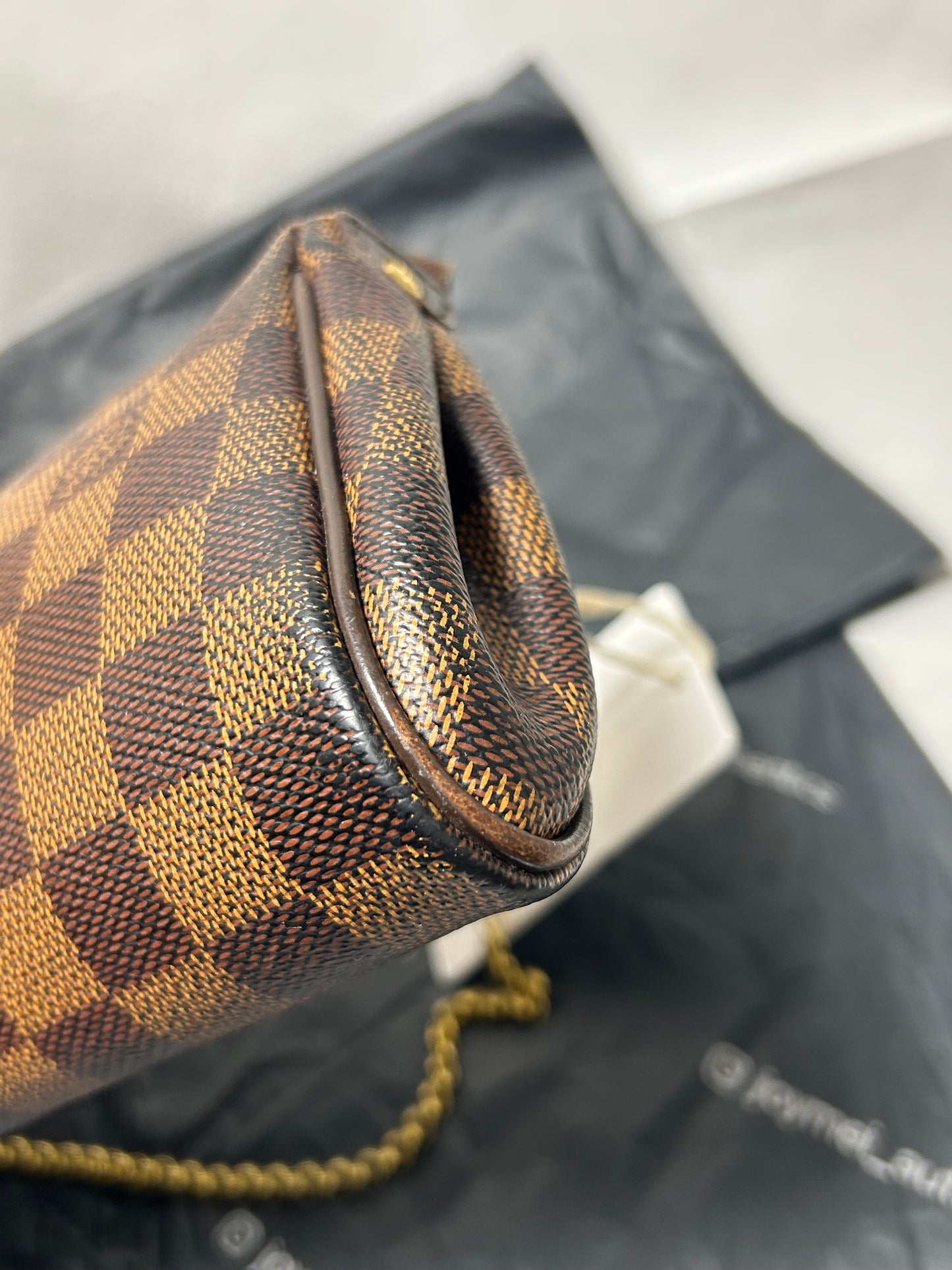 Louis Vuitton Eva clutch bag in Damier Ebene