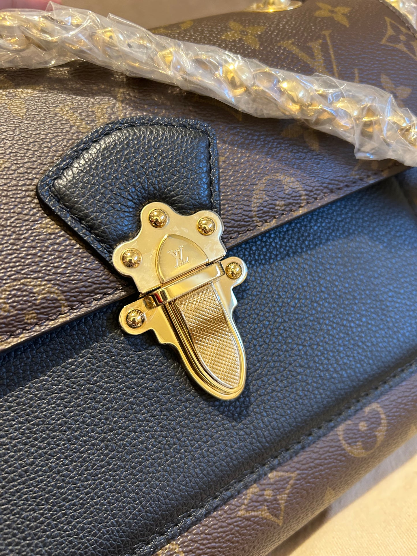 Louis Vuitton victoire in monogram and black leather