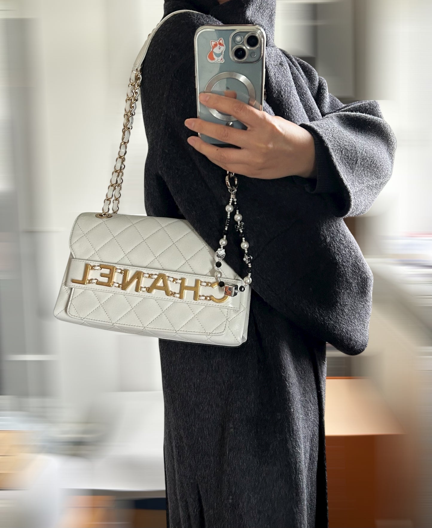 Chanel logo enchained flap bag quilted lambskin