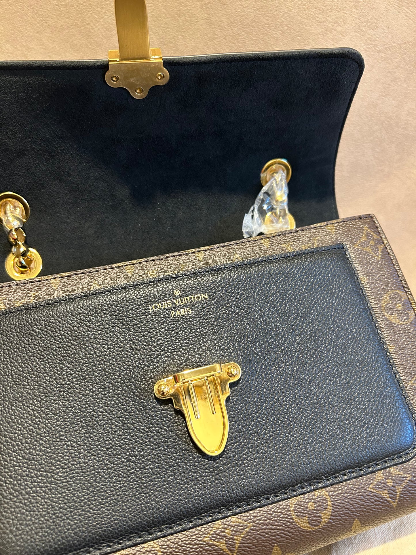 Louis Vuitton victoire in monogram and black leather