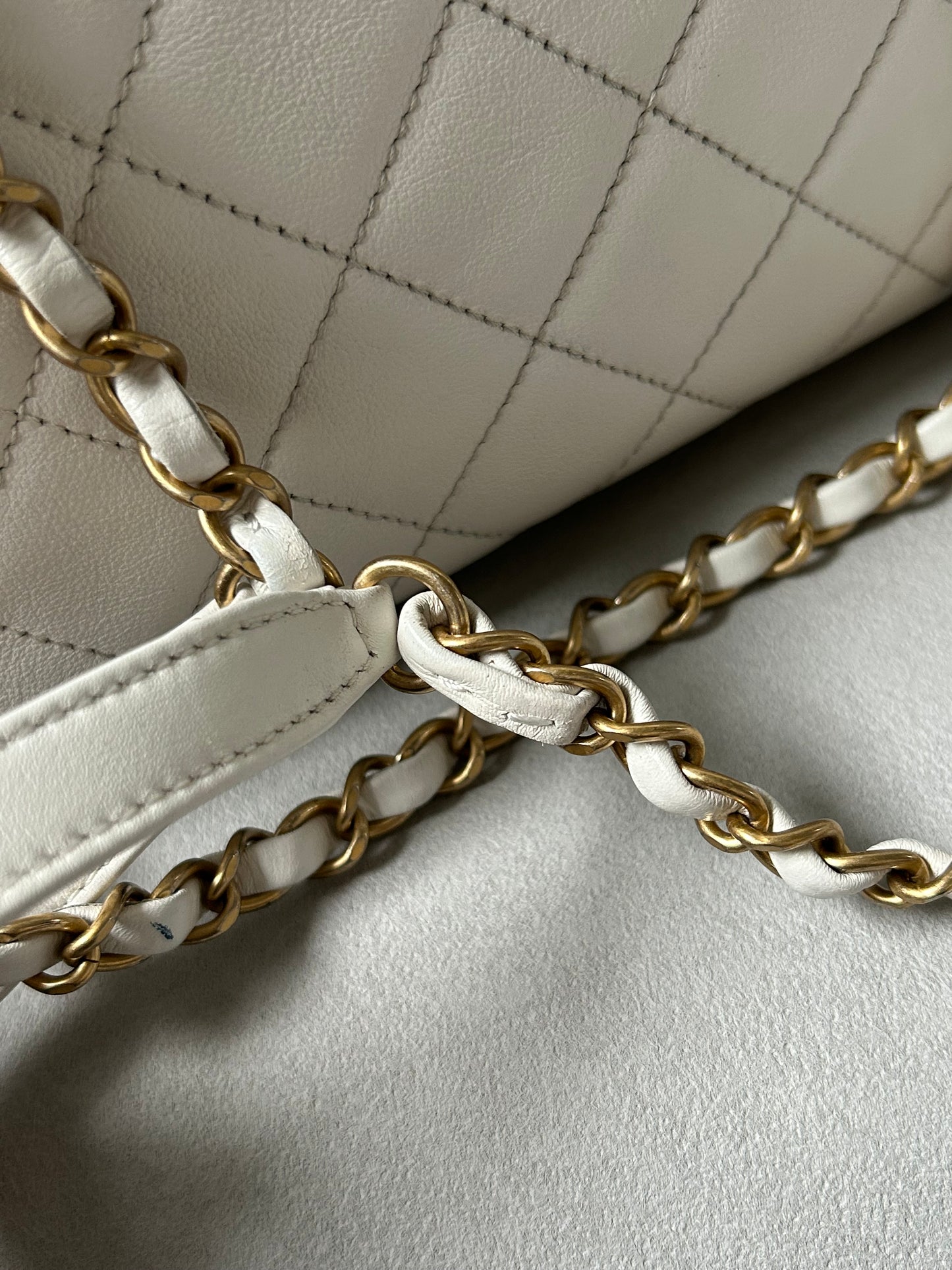 Chanel logo enchained flap bag quilted lambskin