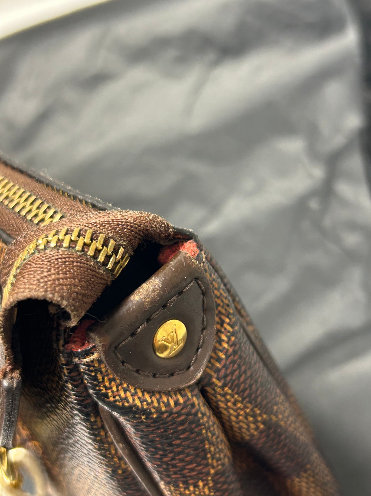 Louis Vuitton Eva clutch bag in Damier Ebene