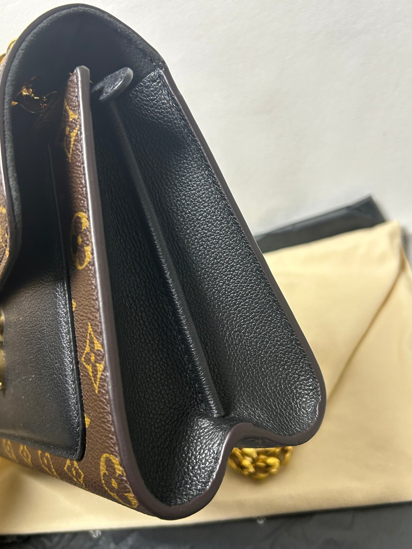 Louis Vuitton victoire monogram and black leather