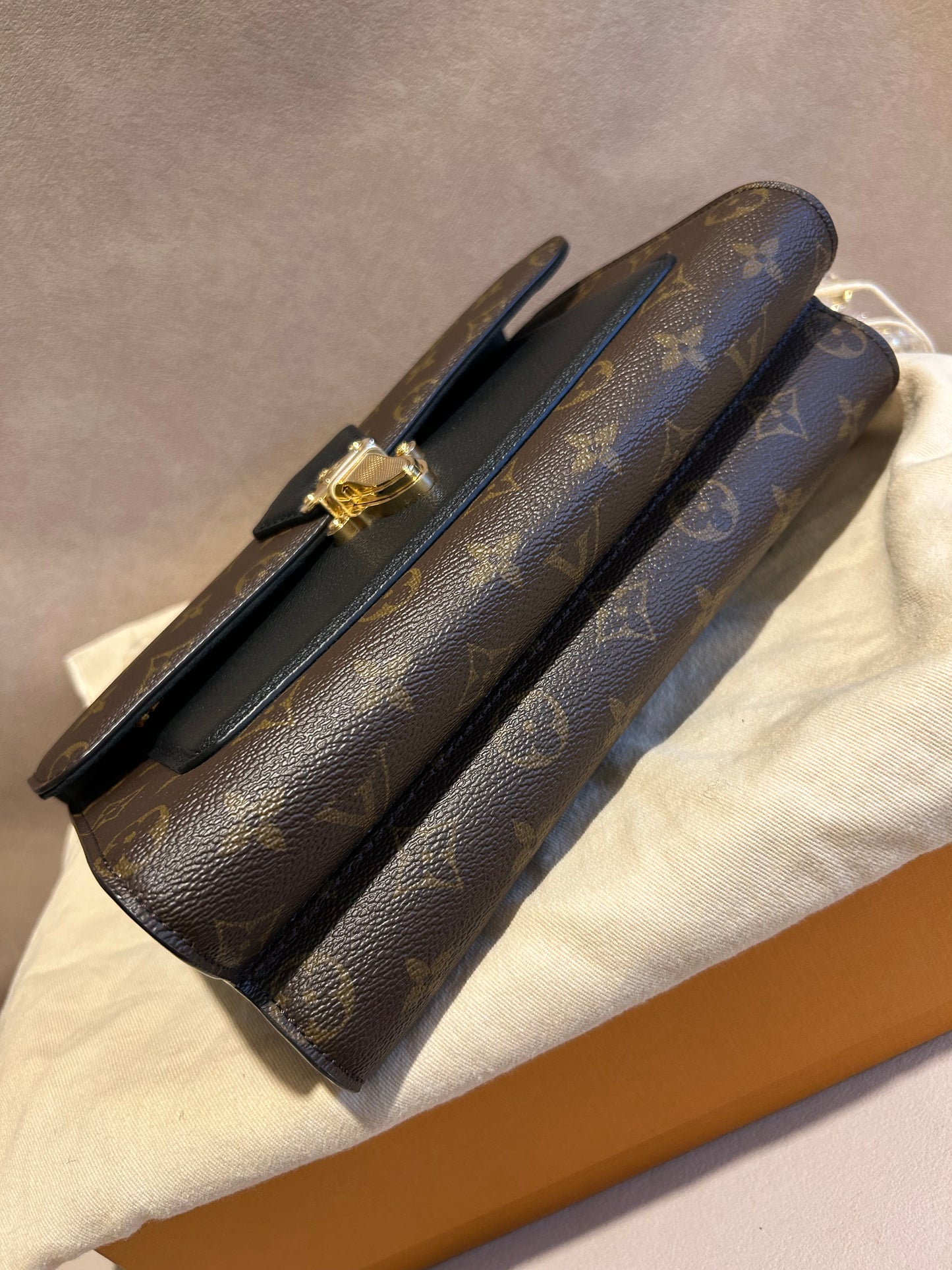 Louis Vuitton victoire in monogram and black leather