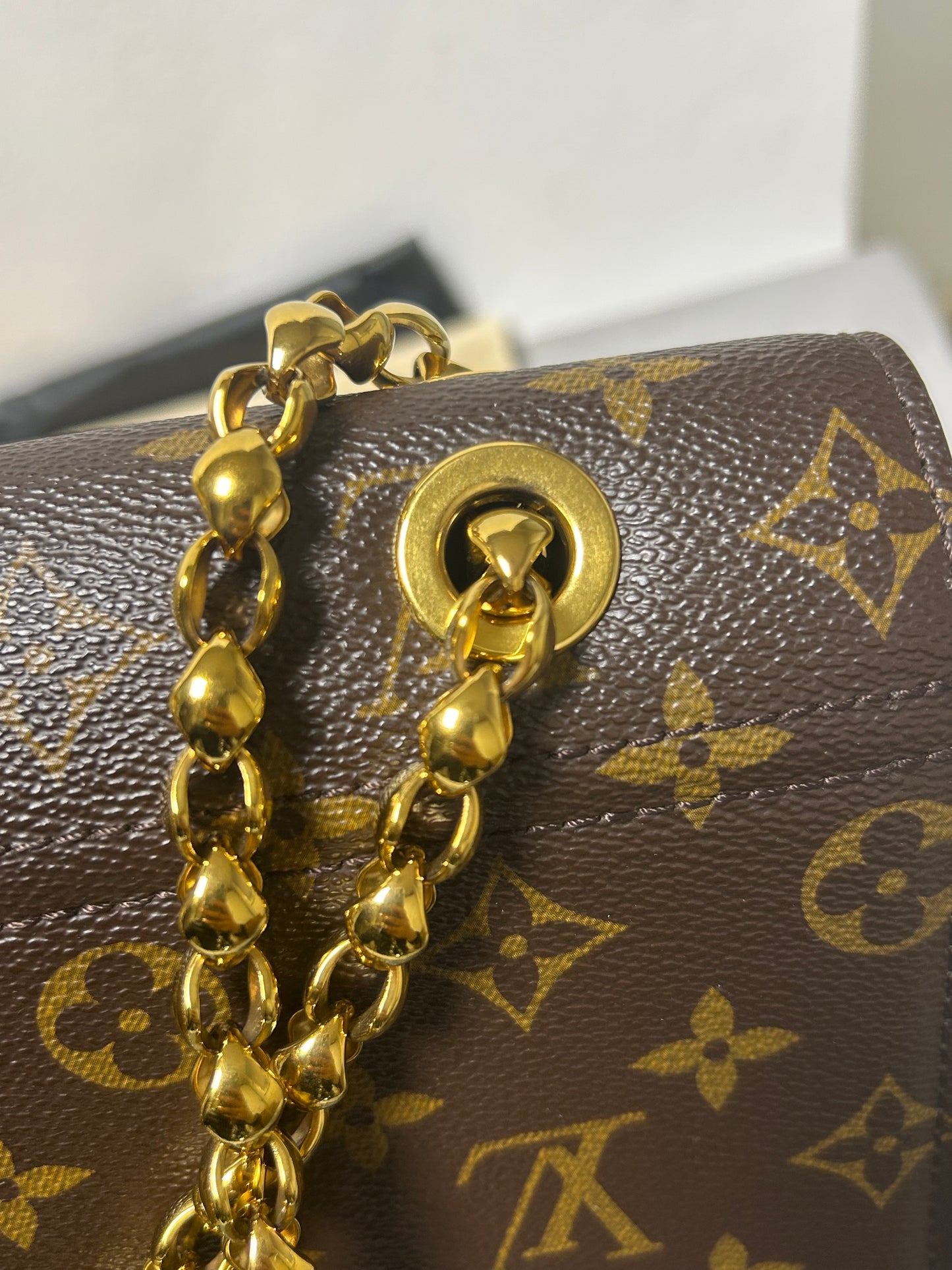 Louis Vuitton victoire monogram and black leather