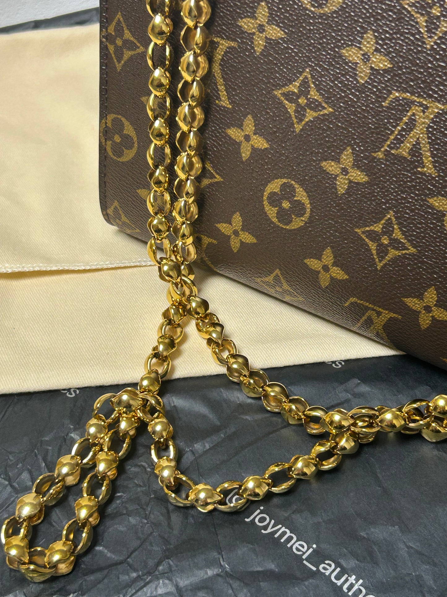 Louis Vuitton victoire monogram and black leather