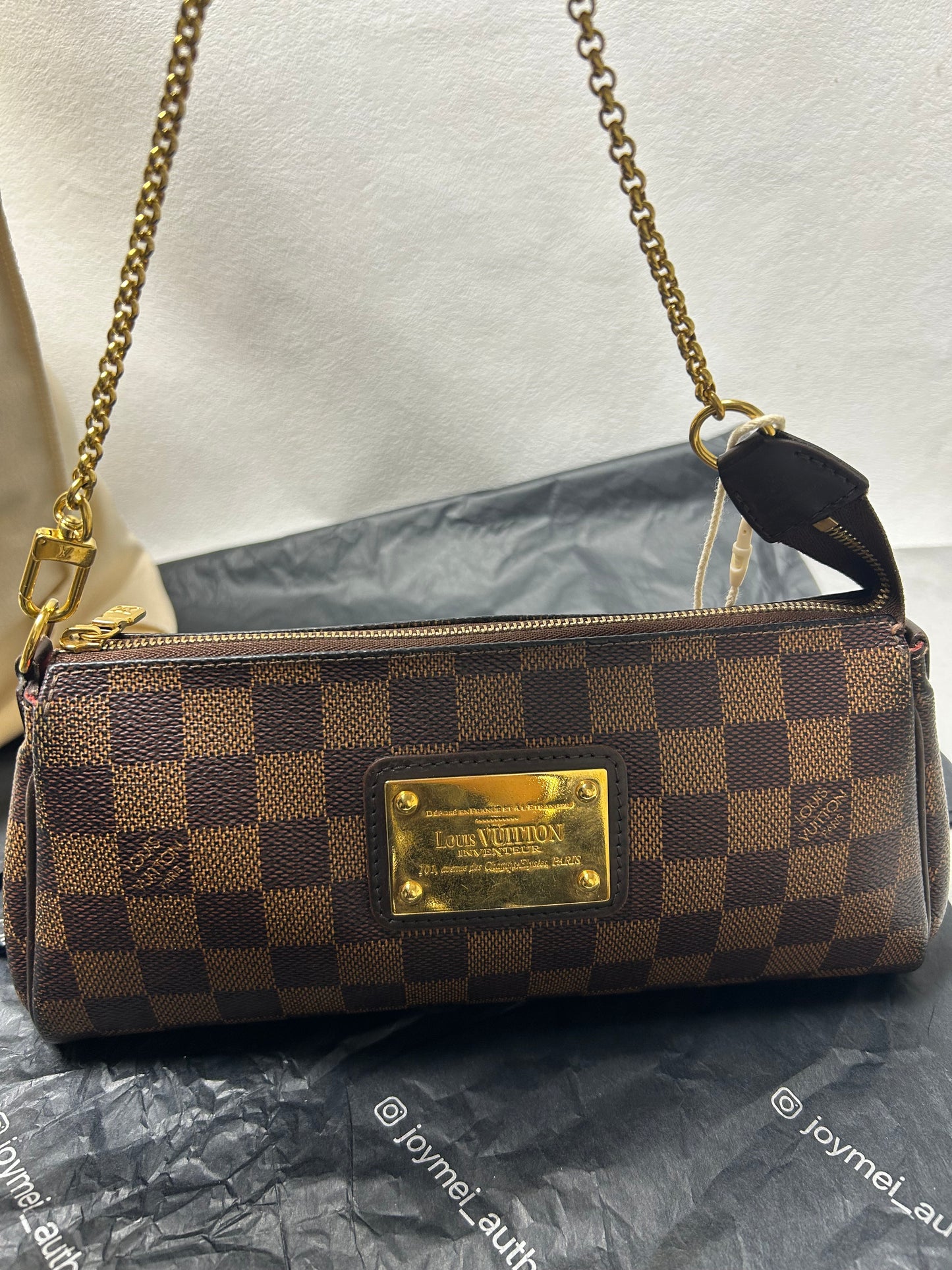 Louis Vuitton Eva clutch bag in Damier Ebene