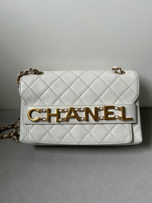 Chanel logo enchained flap bag quilted lambskin