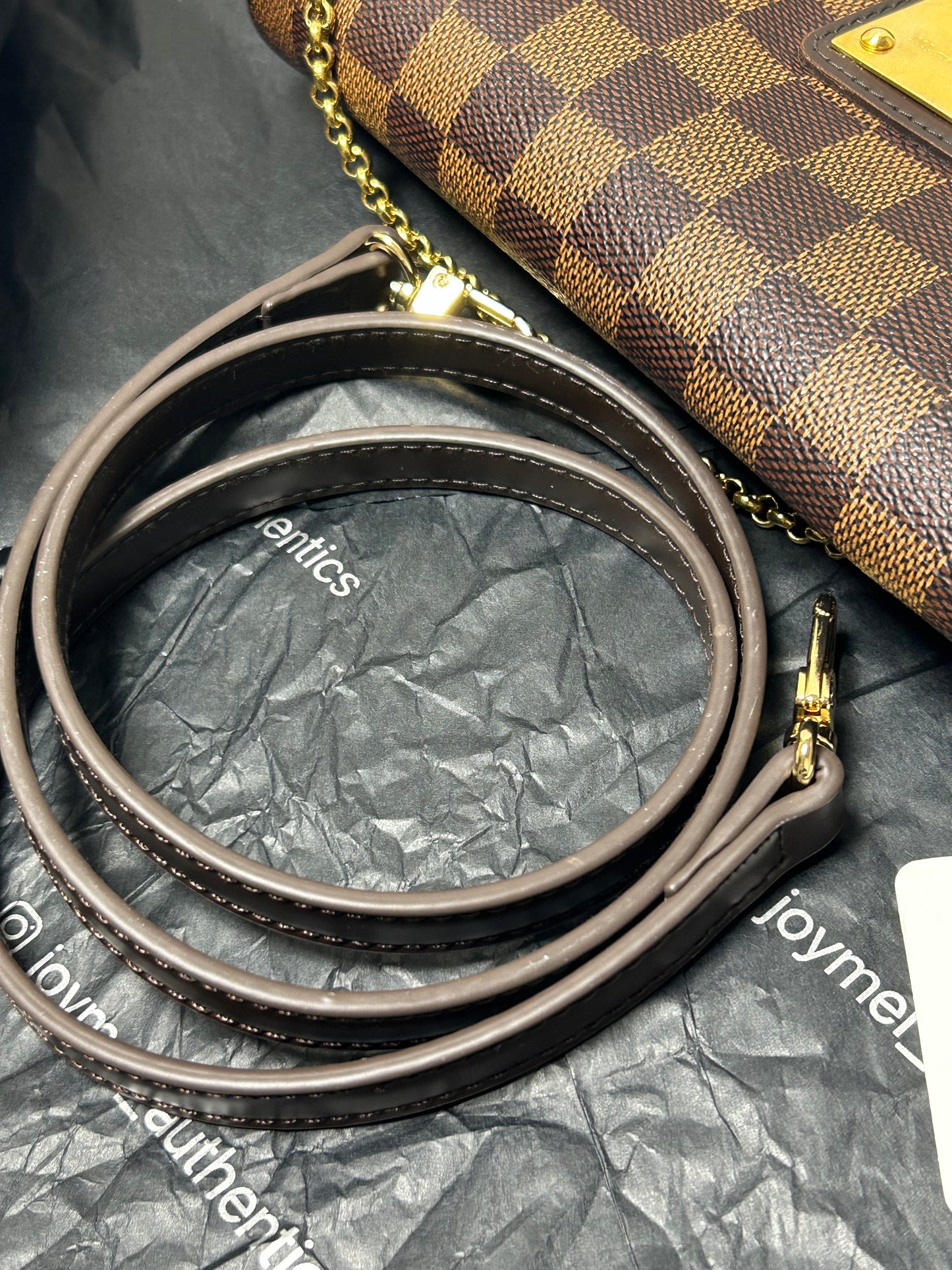 Louis Vuitton Eva clutch bag in Damier Ebene