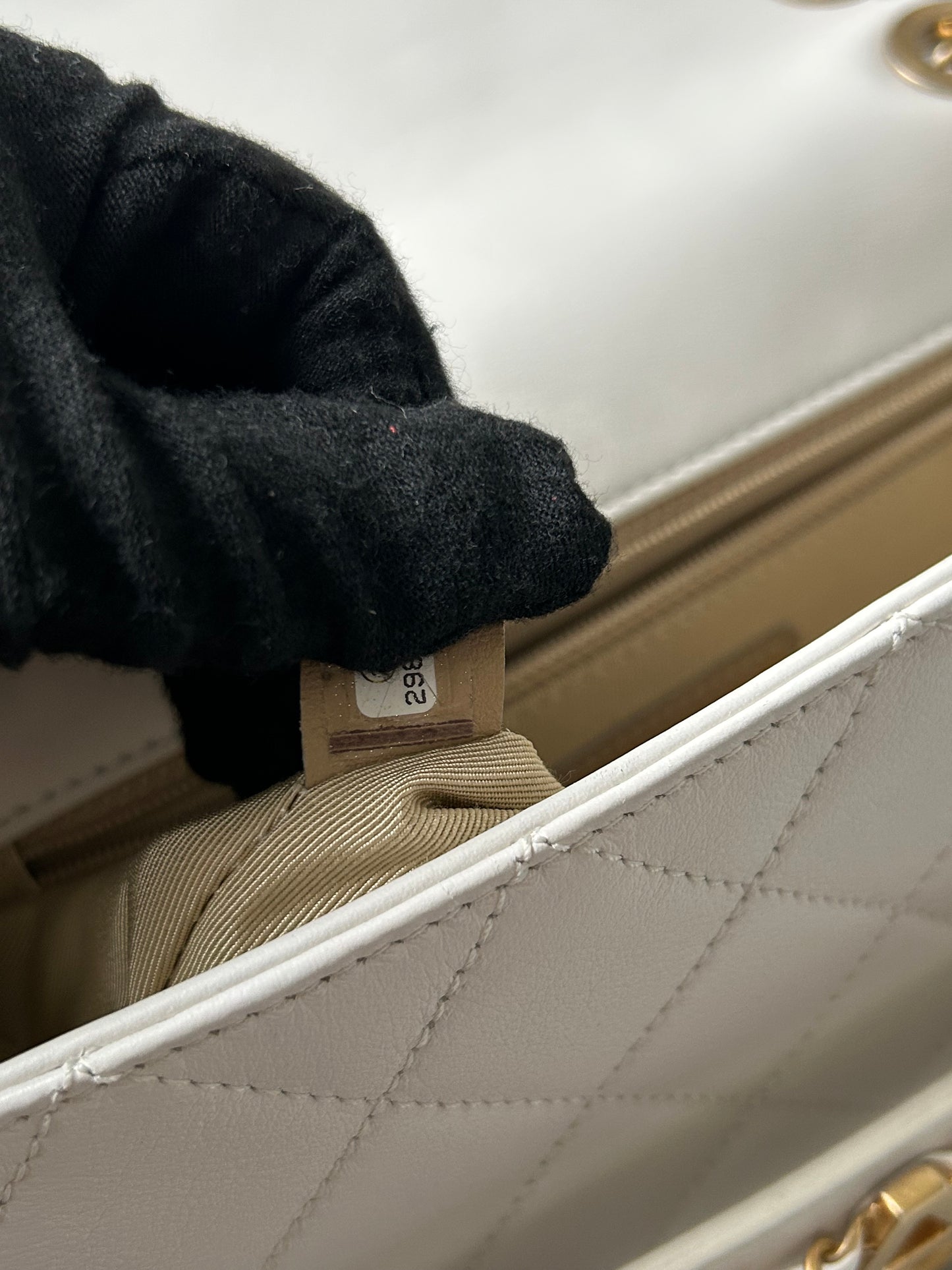 Chanel logo enchained flap bag quilted lambskin