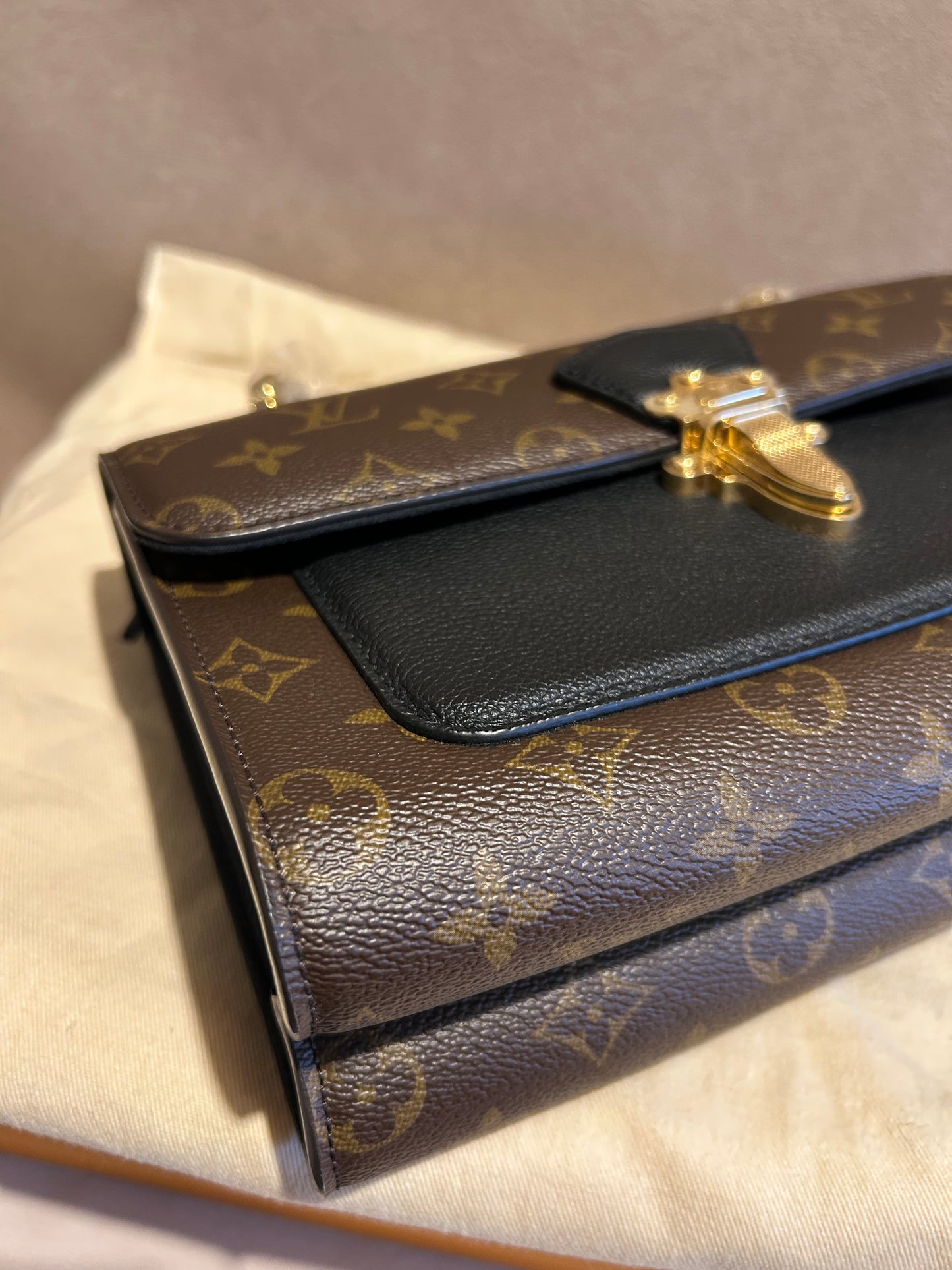 Louis Vuitton victoire in monogram and black leather