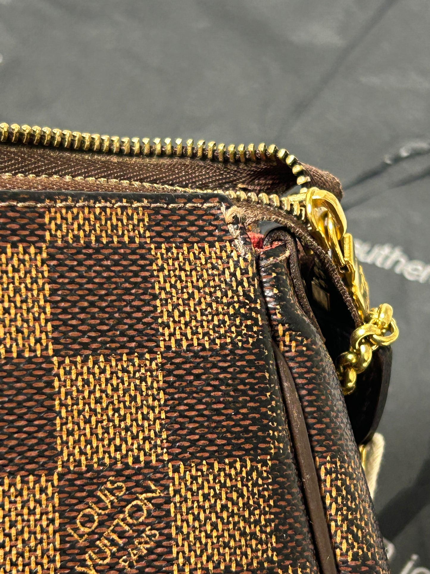 Louis Vuitton Eva clutch bag in Damier Ebene
