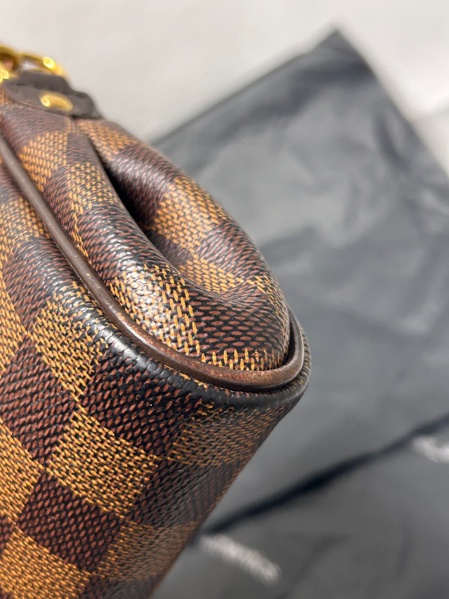 Louis Vuitton Eva clutch bag in Damier Ebene