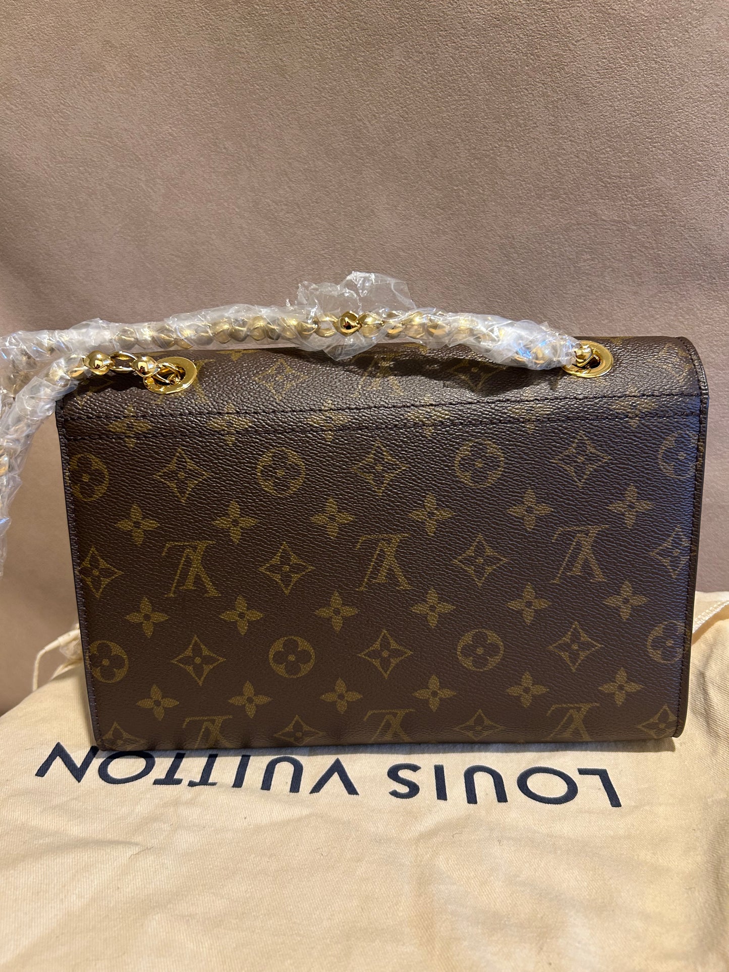 Louis Vuitton victoire in monogram and black leather