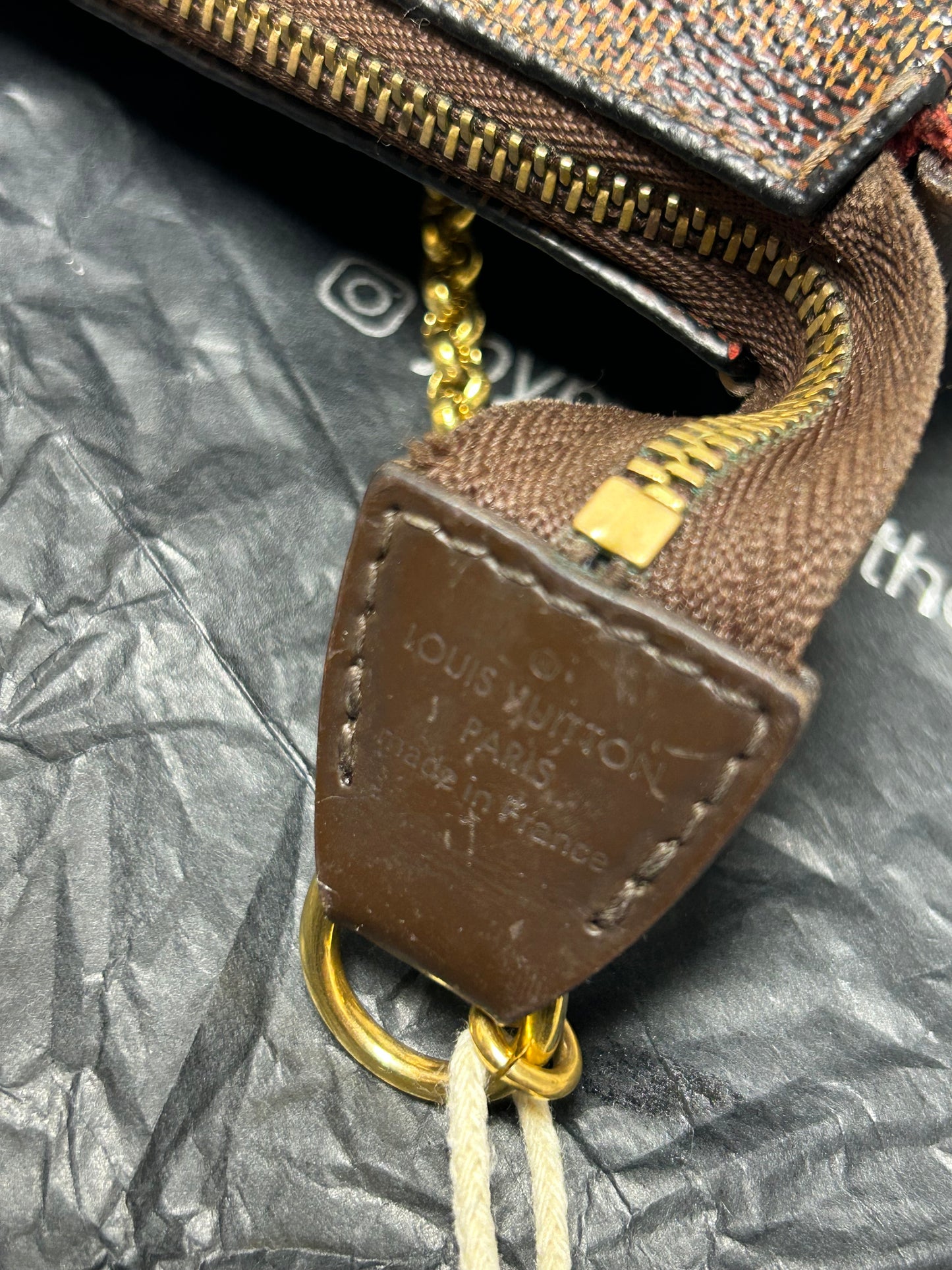 Louis Vuitton Eva clutch bag in Damier Ebene