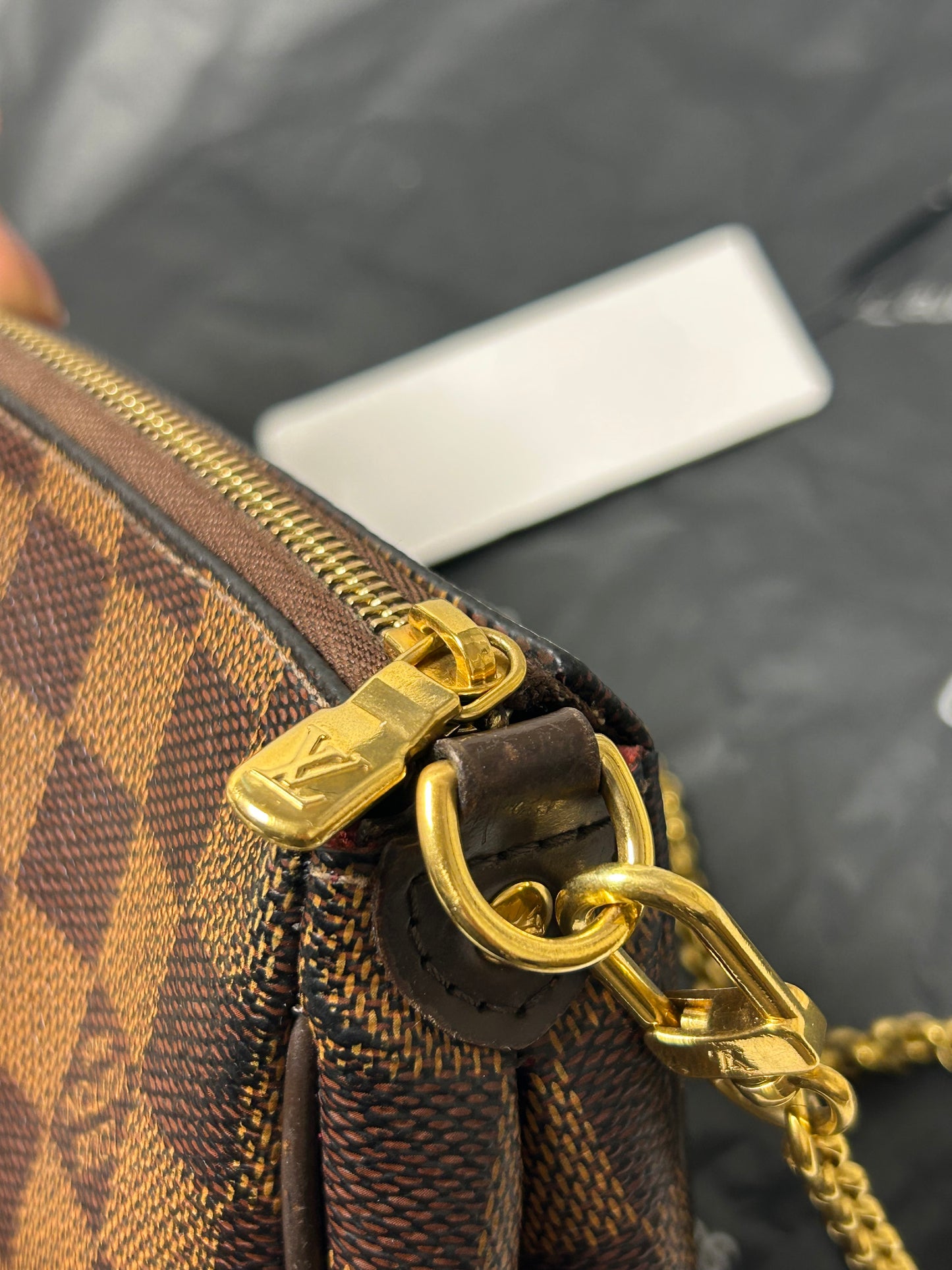 Louis Vuitton Eva clutch bag in Damier Ebene