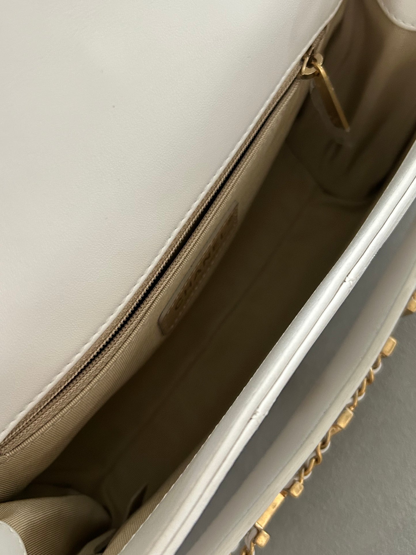 Chanel logo enchained flap bag quilted lambskin